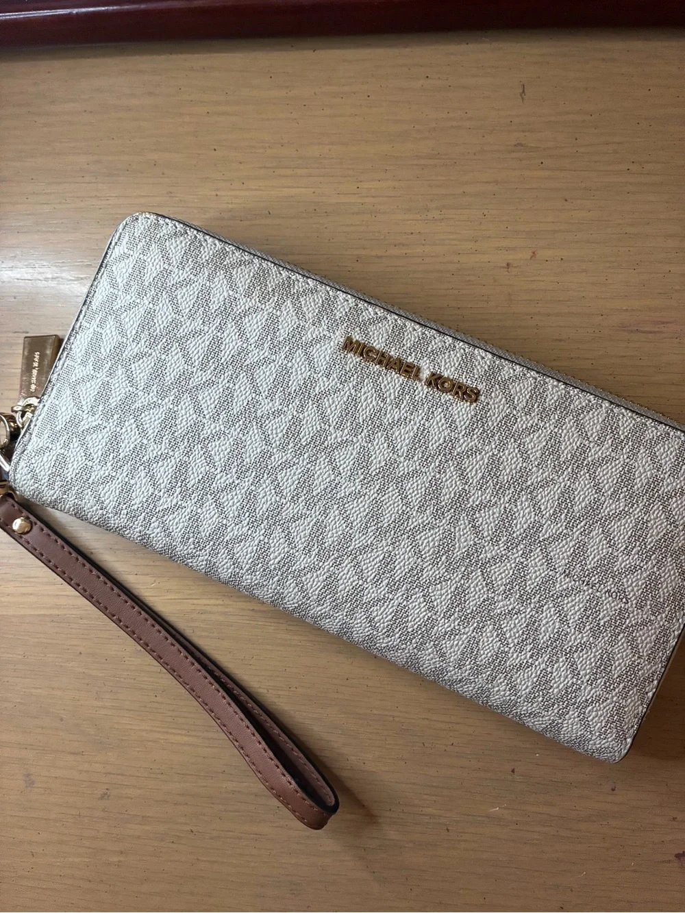 Michael Kors Silver Metallic Logo Zip Wristlet with Brown Strap